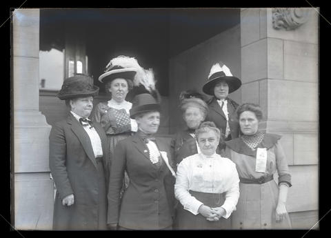 Sarah Evans is in the front row with her hands folded.